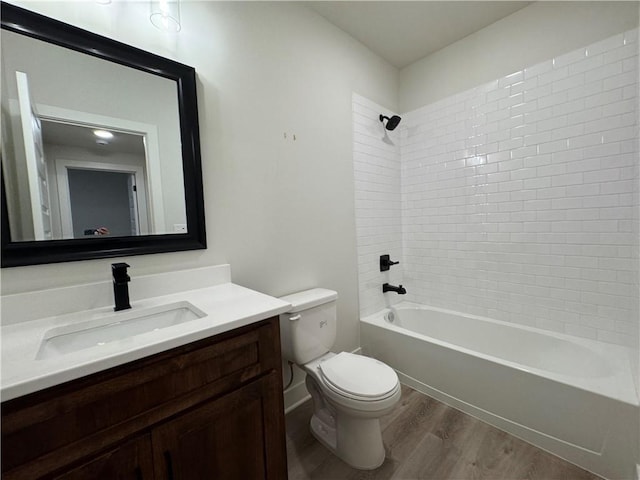 22415 87th Ter, Lenexa, KS 66227 - full bathroom with wood finished floors, vanity, and  shower combination