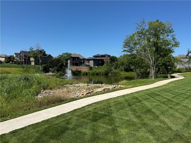 22415 87th Ter, Lenexa, KS 66227 - surrounding community featuring a lawn, a water view, and a residential view