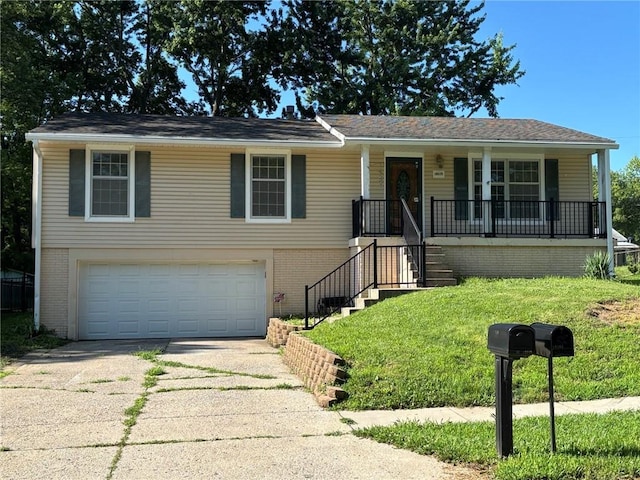 18105 E 18th Ter N, Independence, MO 64058 - ranch-style house with a garage, driveway, brick siding, and covered porch