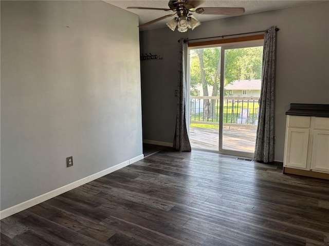 18105 E 18th Ter N, Independence, MO 64058 - spare room with ceiling fan and dark wood-style floors