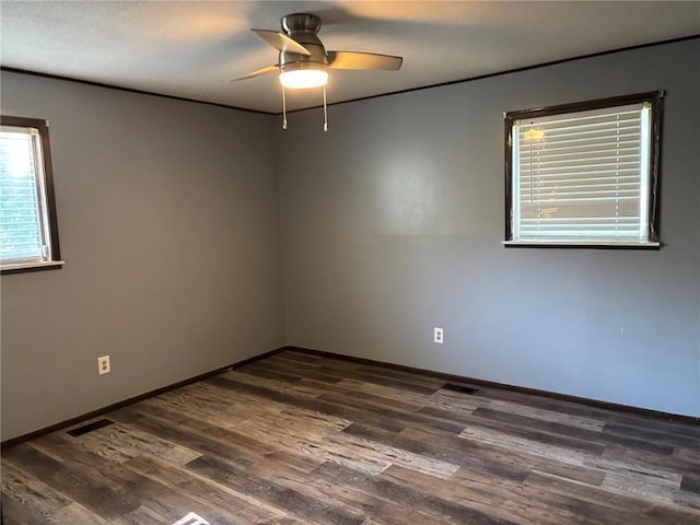 18105 E 18th Ter N, Independence, MO 64058 - unfurnished room featuring a ceiling fan and dark wood-type flooring