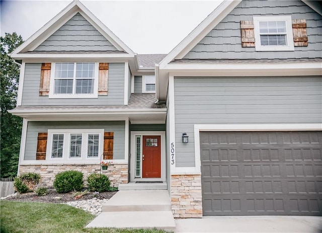 5073 NW Timberline Dr, Riverside, MO 64150 - view of front of property featuring stone siding