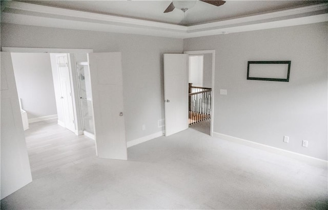 5073 NW Timberline Dr, Riverside, MO 64150 - spare room with a ceiling fan and baseboards