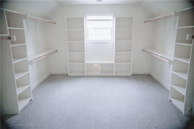 5073 NW Timberline Dr, Riverside, MO 64150 - spacious closet with vaulted ceiling and carpet floors