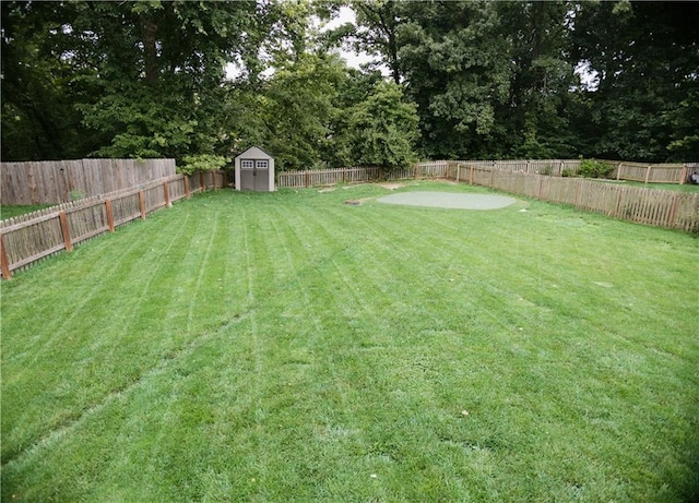5073 NW Timberline Dr, Riverside, MO 64150 - fenced backyard with a storage unit