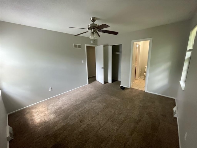 3212 Canterbury Rd, Blue Springs, MO 64015 - unfurnished bedroom featuring carpet floors, ensuite bathroom, a ceiling fan, and a closet