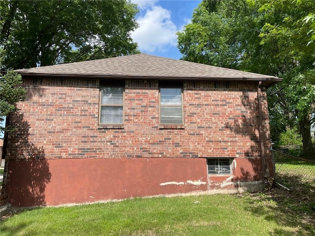 3212 Canterbury Rd, Blue Springs, MO 64015 - view of side of property with roof with shingles and brick siding