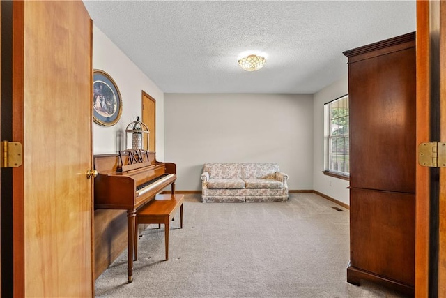 17014 E 45th St S, Independence, MO 64055 - sitting room with carpet floors and a textured ceiling
