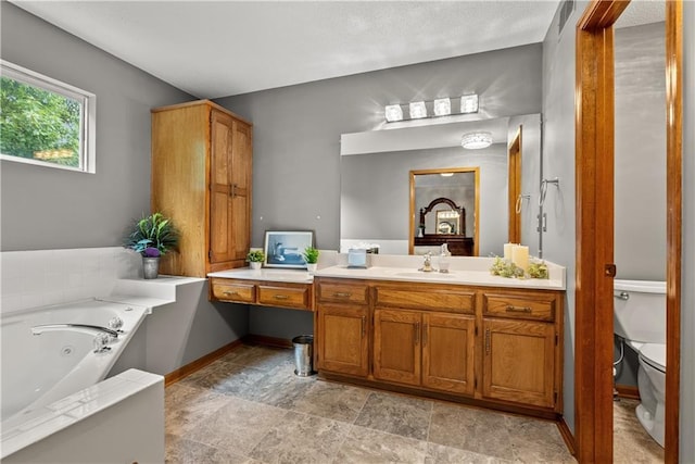 17014 E 45th St S, Independence, MO 64055 - full bath with a jetted tub, vanity, and stone finish floors