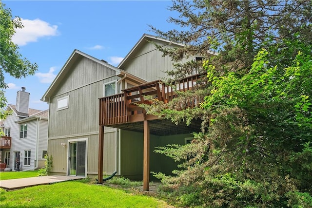 17014 E 45th St S, Independence, MO 64055 - rear view of property featuring a lawn, a deck, and a patio