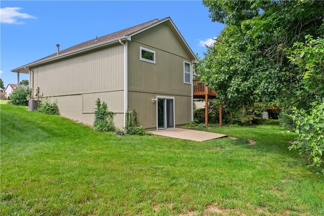 17014 E 45th St S, Independence, MO 64055 - back of property featuring a patio area and a lawn