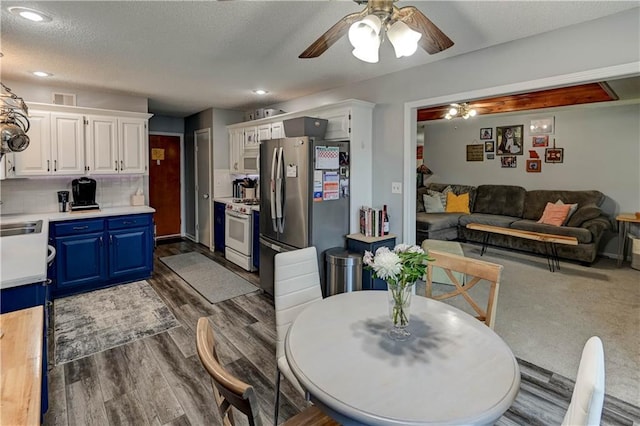 2013 NE Summerfield Ct, Blue Springs, MO 64029 - dining room with a ceiling fan, dark wood finished floors, and recessed lighting