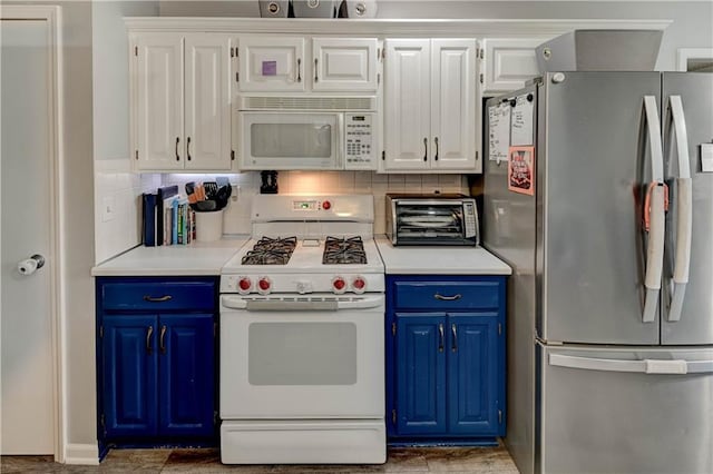 2013 NE Summerfield Ct, Blue Springs, MO 64029 - kitchen with white appliances, blue cabinetry, and white cabinetry