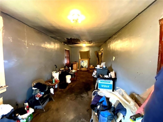 5433 E 29th St, Kansas City, MO 64128 - miscellaneous room featuring concrete floors