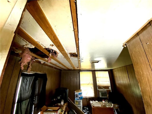 5433 E 29th St, Kansas City, MO 64128 - misc room with wooden walls and cooling unit