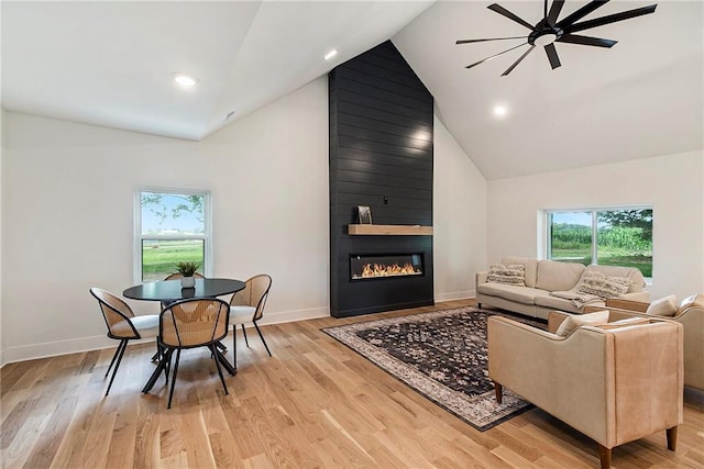 51 SE 208th St, Holt, MO 64048 - living area with plenty of natural light, a ceiling fan, light wood-type flooring, high vaulted ceiling, and recessed lighting