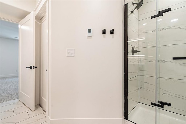 51 SE 208th St, Holt, MO 64048 - bathroom featuring a marble finish shower and marble finish flooring