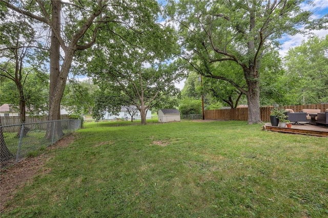 7000 Dearborn St, Overland Park, KS 66204 - fenced backyard with a wooden deck and an outdoor hangout area