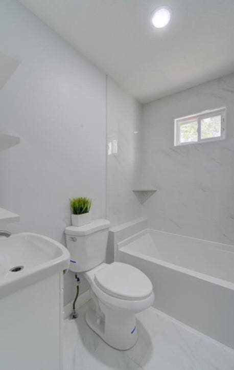 2507 E 69th St, Kansas City, MO 64132 - full bathroom with toilet and vanity