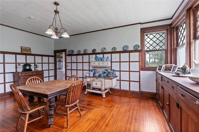 1080 SW 58th Hwy, Holden, MO 64040 - dining area with ornamental molding and a chandelier