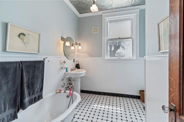 1080 SW 58th Hwy, Holden, MO 64040 - full bathroom with a freestanding bath, wainscoting, and ornamental molding