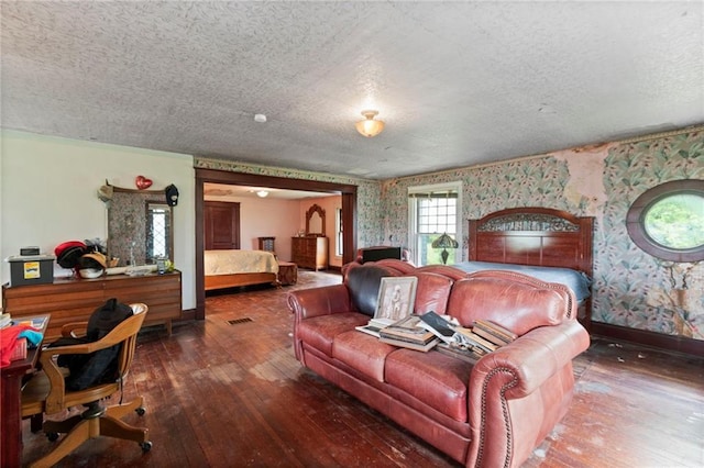 1080 SW 58th Hwy, Holden, MO 64040 - living room with wallpapered walls, hardwood / wood-style floors, and a textured ceiling