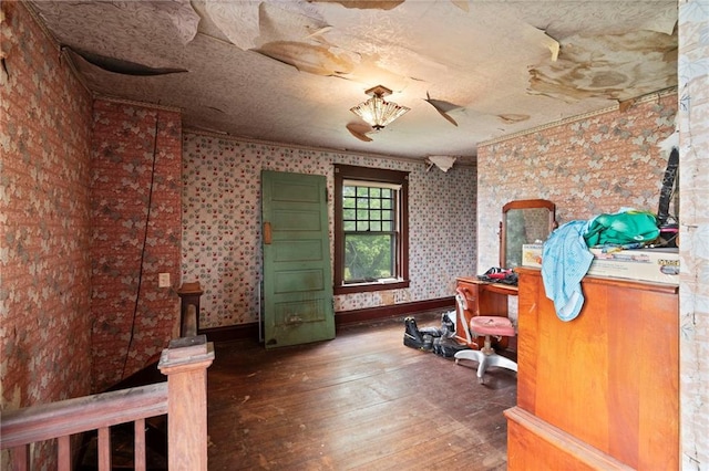 1080 SW 58th Hwy, Holden, MO 64040 - bedroom featuring wood-type flooring and wallpapered walls