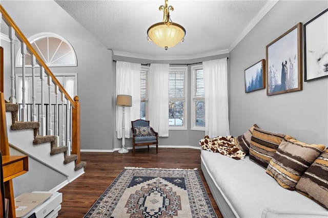 20586 W 220th St, Spring Hill, KS 66083 - living room with wood finished floors, stairs, a textured ceiling, and ornamental molding