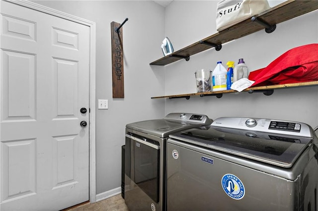20586 W 220th St, Spring Hill, KS 66083 - laundry room featuring washing machine and dryer and baseboards