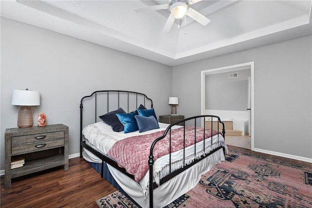 20586 W 220th St, Spring Hill, KS 66083 - bedroom featuring a tray ceiling, wood finished floors, and ceiling fan