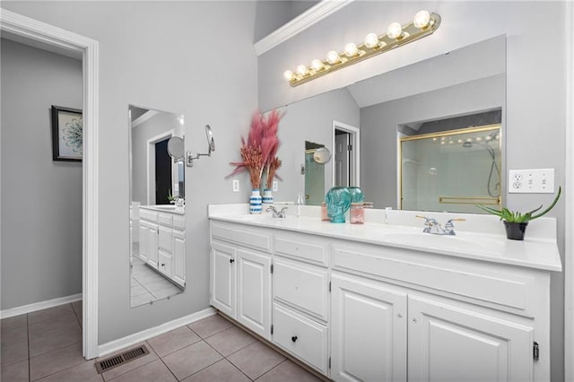 20586 W 220th St, Spring Hill, KS 66083 - full bathroom with double vanity, a shower stall, and tile patterned floors