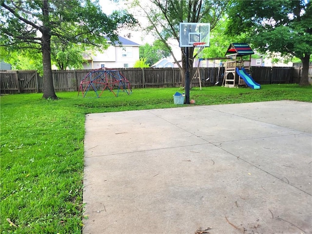 20586 W 220th St, Spring Hill, KS 66083 - fenced backyard with a playground and a patio