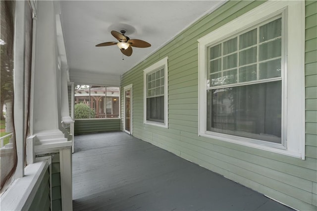 704 Lincoln St, Coffeyville, KS 67337 - porch with a ceiling fan