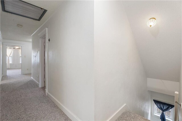 704 Lincoln St, Coffeyville, KS 67337 - hall with carpet floors and baseboards