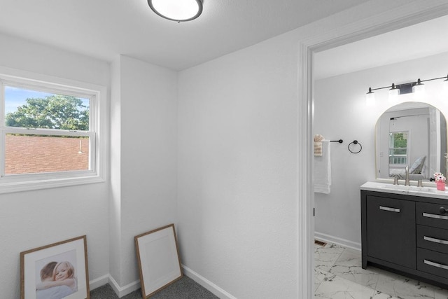 1233 S Pleasant St, Independence, MO 64055 - bathroom featuring vanity and marble finish flooring