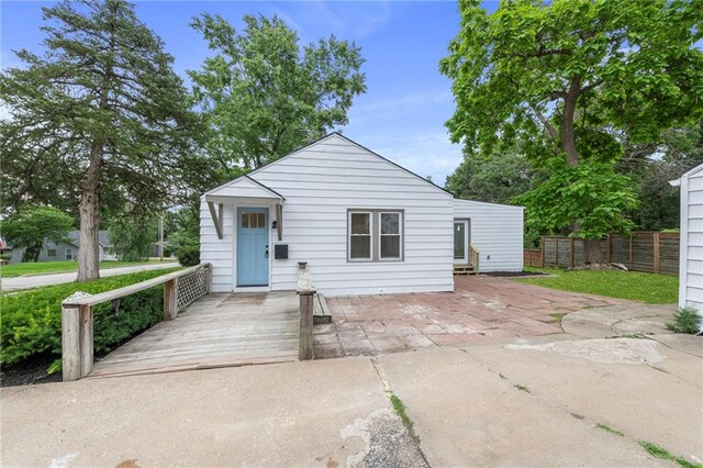 9521 W 60th St, Merriam, KS 66203 - view of front of property with a patio
