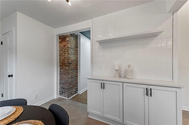 9521 W 60th St, Merriam, KS 66203 - kitchen featuring tasteful backsplash and open shelves