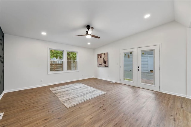 9521 W 60th St, Merriam, KS 66203 - unfurnished room featuring a ceiling fan, wood finished floors, french doors, vaulted ceiling, and recessed lighting