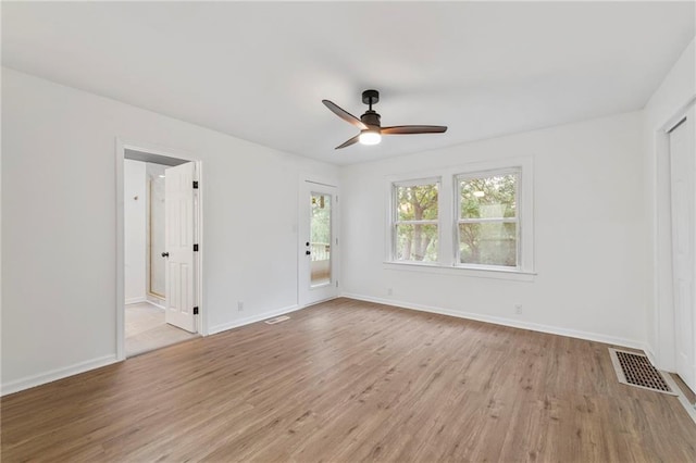 9521 W 60th St, Merriam, KS 66203 - spare room with light wood-type flooring and a ceiling fan