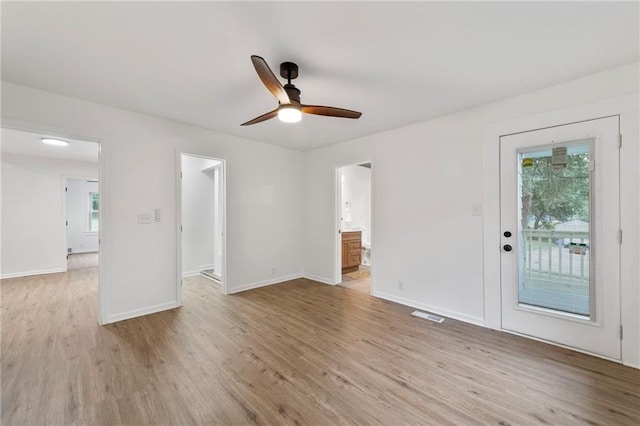 9521 W 60th St, Merriam, KS 66203 - unfurnished room with light wood-style floors and a ceiling fan