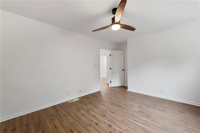 9521 W 60th St, Merriam, KS 66203 - empty room featuring wood finished floors and a ceiling fan