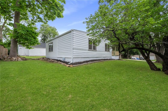 9521 W 60th St, Merriam, KS 66203 - view of side of property with a yard