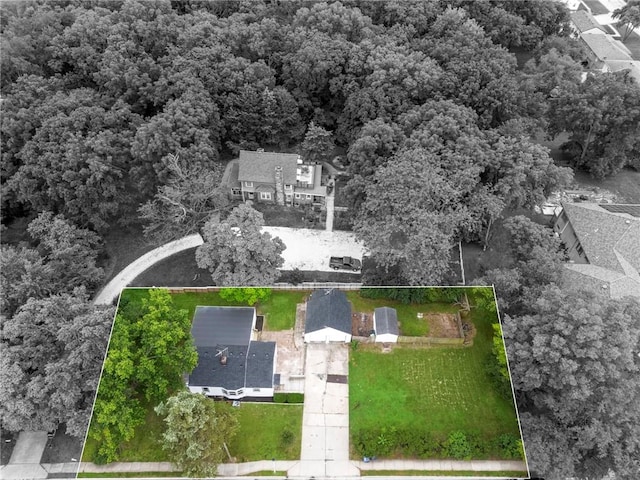 9521 W 60th St, Merriam, KS 66203 - view of property location with property boundaries highlighted and a heavily wooded area