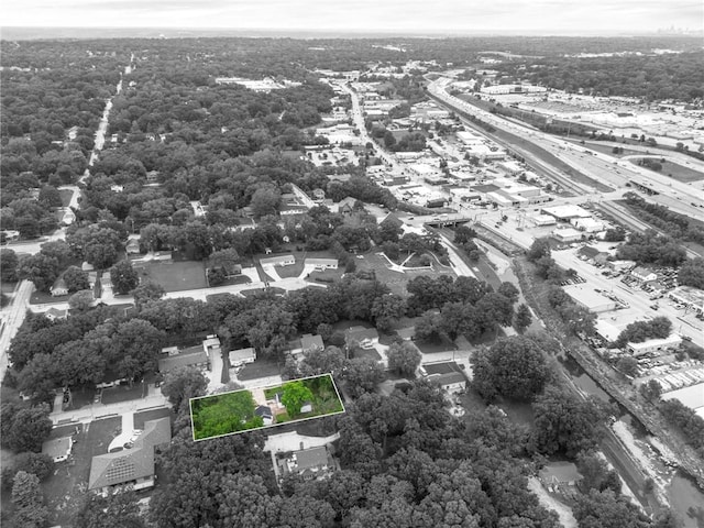 9521 W 60th St, Merriam, KS 66203 - aerial view of property and surrounding area with property parcel outlined and a main thoroughfare