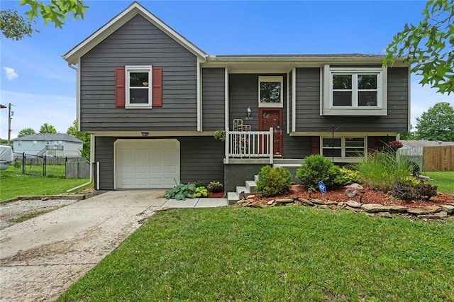 33145 W 88th Ter, De Soto, KS 66018 - bi-level home with concrete driveway and a garage