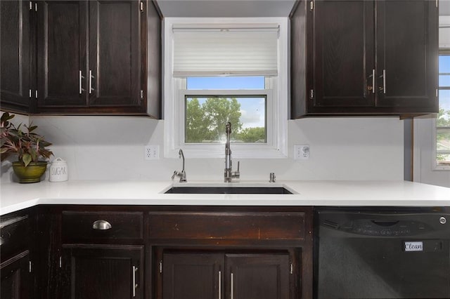 33145 W 88th Ter, De Soto, KS 66018 - kitchen featuring black dishwasher, healthy amount of natural light, dark brown cabinetry, and light countertops