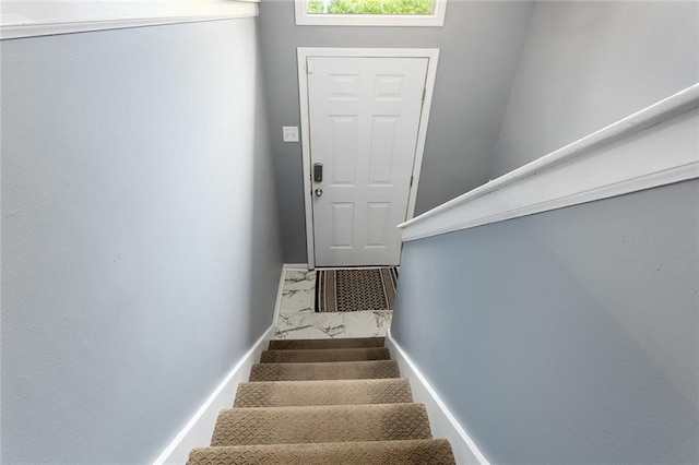 33145 W 88th Ter, De Soto, KS 66018 - stairway with baseboards and marble look tiles