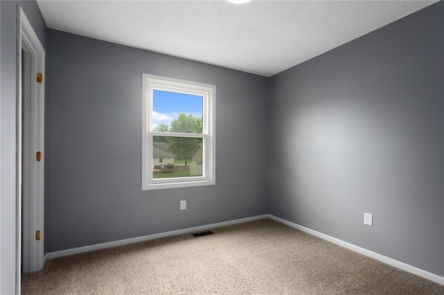 33145 W 88th Ter, De Soto, KS 66018 - unfurnished room with carpet floors and a textured ceiling