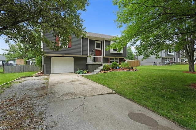 33145 W 88th Ter, De Soto, KS 66018 - split foyer home featuring concrete driveway and a garage