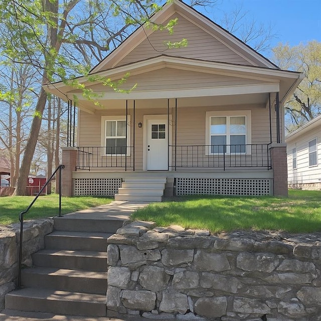 308 N Lawndale Ave, Kansas City, MO 64123 - view of front of property with a porch